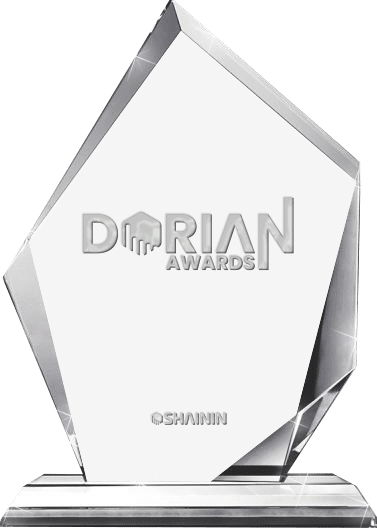 Dorian Award Trophy | Solid glass award with modern angular shape standing on a solid reactanguler platform with the Dorian Award logo and Shainin logo