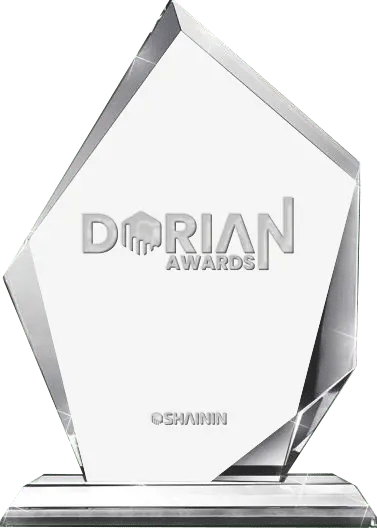 Dorian Award Trophy | Solid glass award with modern angular shape standing on a solid reactanguler platform with the Dorian Award logo and Shainin logo